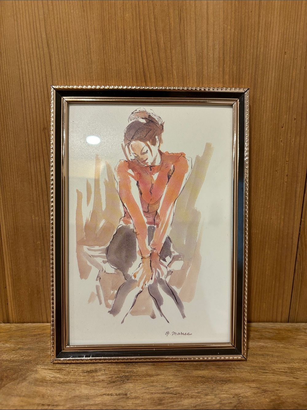 Black and gold coloured metal picture frame